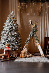 Children's room decorated in Christmas style. Wooden sleigh, gifts and hut for children to play.
