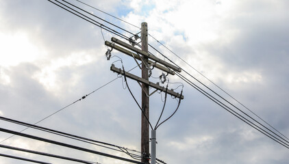 electricity transmission towers against a colorful sky at dusk, symbolizing power, connectivity, and urban infrastructure future green energy 