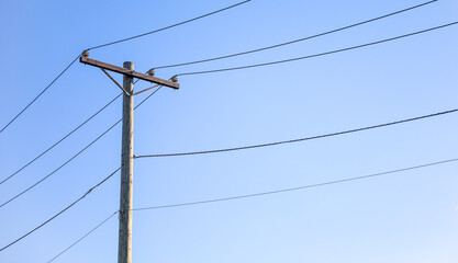 electricity transmission towers against a colorful sky at dusk, symbolizing power, connectivity, and urban infrastructure future green energy 