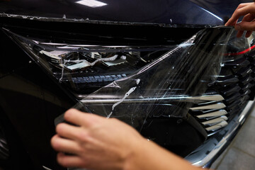 Protection of hood and front of the car with a colorless protective film.