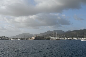 View of Bodrum Turkiye Castle and Harbor backed by Mountains from the Mediterranean
