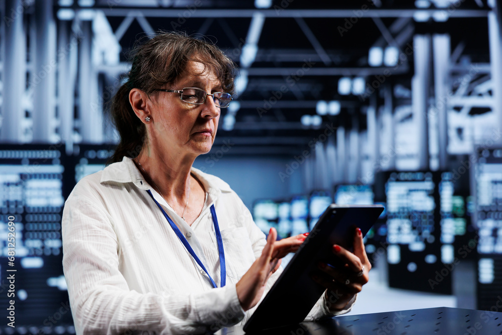 Poster senior it developer using tablet to assess server cybersecurity issues arising due to unsecured netw