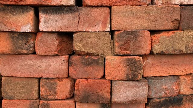 Video of background and texture of bricks in a craft factory in South America. Concept of industries.