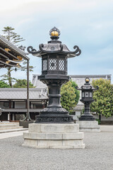 Fototapeta premium Huge entrance lanterns found in Higashi Honganji temple in Kyoto, Japan. Majestic decorative lanterns made of bronze. 