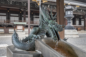 Big dragon in Higashi Honganji temple in Kyoto, Japan.
A dragon supplying ceremonial water at...