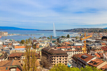 Panoramic view of city of Geneva, Lake Geneva and Jet d'Eau fountain in Switzerland. View from the...