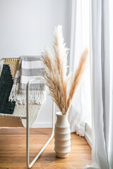 Bunch of pampas grass in vase, styled in home