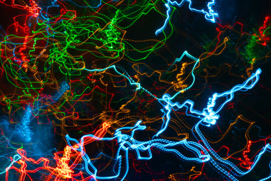Colorful agitated lines on a black background