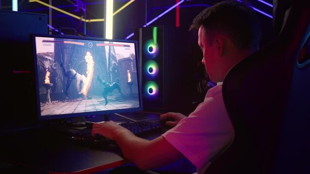 Round In Fighting Esport Competition Two Players Engaged In Battle. Gamer Loses Match In Fighting Game Esport Competition. Playing On PC. Fighting Martial Artists. Esports Competition Concept