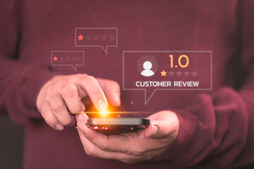 Customer review and feedback with rate 1 star on virtual screen. Assessment testimonial review for dislike service and low quality. Business concept of customer experience dissatisfied by smartphone. - obrazy, fototapety, plakaty