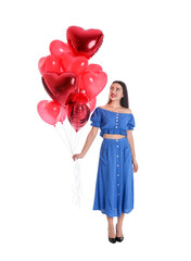 Beautiful young woman with heart shaped balloons isolated on white. Valentine's day celebration