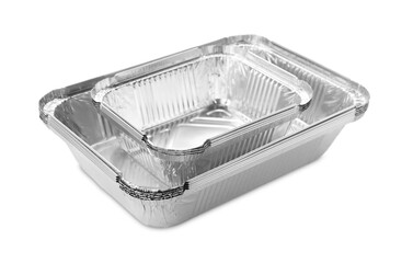 Many different aluminum foil containers isolated on white