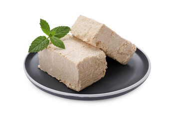 Plate with pieces of tasty halva and mint isolated on white