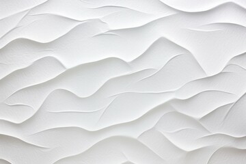 Wavy white paper texture with soft shadows creating a serene, rhythmic pattern.