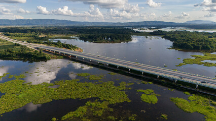 Aerial view of the long bridge build for crossing Nong Luang the largest lake in Wiang Chai...