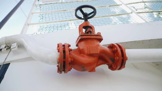 Close-up of the valve located on the communication pipe. Shooting on the ship