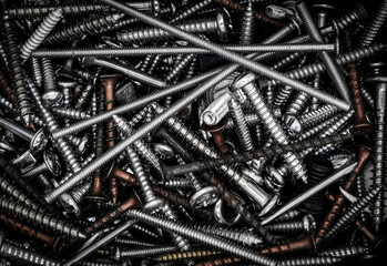 a pile of nut, bolts, and screws