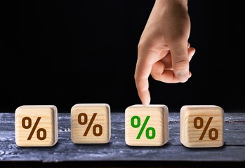 Pick a percentage. Wooden cubes with icons