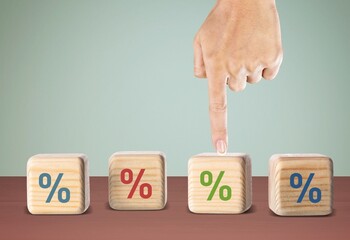 Pick a percentage. Wooden cubes with icons