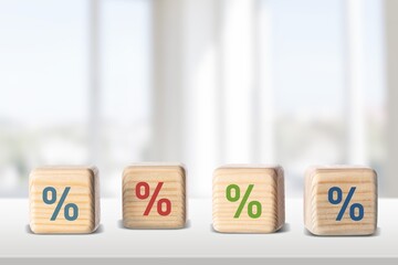 Pick a percentage. Wooden cubes with icons
