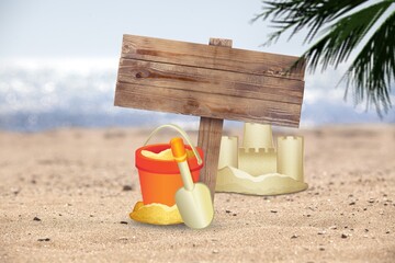 old wooden road signpost at beach, holiday concept