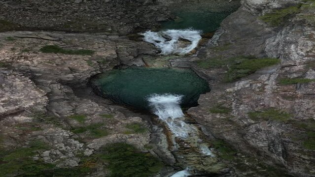 Vertical top down aerial of Devils Punchbowl waterfall in Crested Butte Colorado