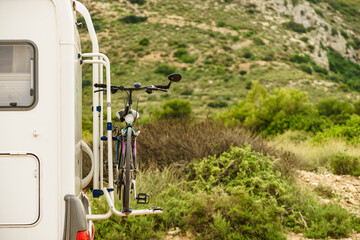 Camper with bicycle on back rack