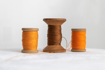 Three vintage spools of thread