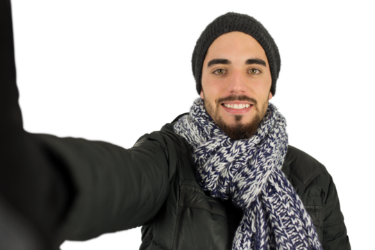 Digital png photo of happy biracial man with stretched arm on transparent background