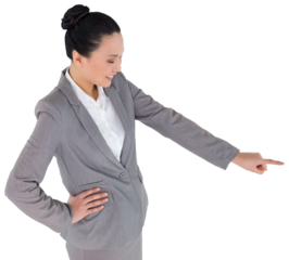 Digital png photo of happy asian businesswoman pointing on transparent background