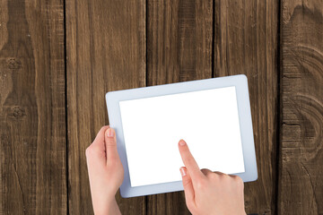 Digital png photo of hands using tablet on wood boards with copy space on transparent background