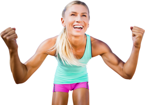 Digital png photo of happy caucasian sportswoman raising fists and smiling on transparent background - Powered by Adobe