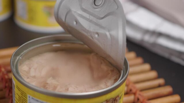 canned tuna on wooden table ,