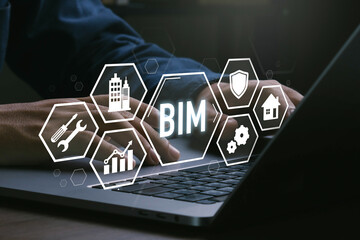 BIM,Building Information Modeling system technology concept.Engineer's hands using computers.BIM on...
