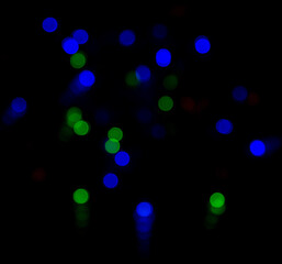 colorful flashes of lights on a black background.