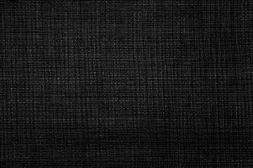 Fototapeta na wymiar Carbon fiber background. Texture of black fabric for tailoring, Cloth
