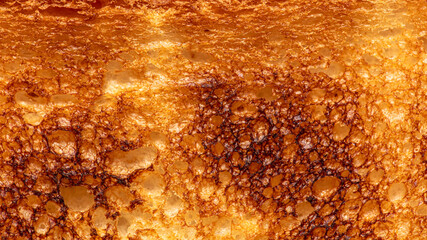 Bread fried in a toaster as an abstract background. Macro