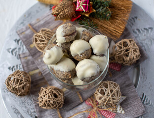 Christmas cookies with poppy seeds, jam and white choclate glaze 