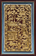 vintage door decorative in penang. Peranakan style door carving glided with gold leaf.