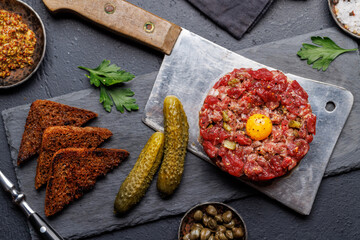 Savory beef tartare and brown bread toasts