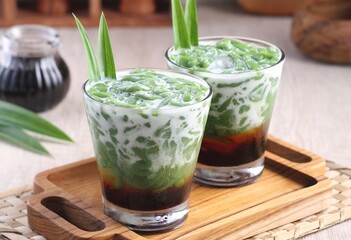 Cendol is a sweet dessert that contains droplets of green rice flour jelly, coconut milk and palm...