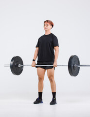 Isolated cutout full body studio shot of strong Asian male fitness athlete sportsman trainer model in casual sport workout outfit lifting barbell training exercising deadlift on white background