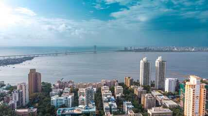 Aerial view of Bandra Worli Sealink Mumbai Modern City high-rise skyscraper buildings. Beautiful cloudy, rainy weather.