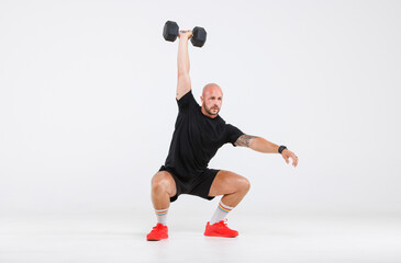 Isolated cutout full body studio shot of strong Caucasian male fitness athlete sportman trainer in...