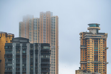 Aerial view of Mumbai city in Maharashtra, India. Beautiful cloudy weather during monsoon. Indian Cityscape.