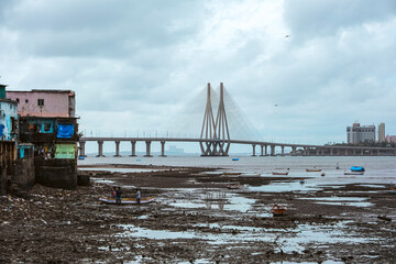 Aerial view of vehicles Passing over Bandra Worli Sea Link in Mumbai, India. Weather in Mumbai, Morning skyline Mumbai. Developing India concept. Longest Bridge in India.