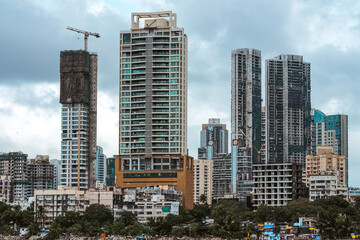 Fototapeta na wymiar Modern City high-rise skyscraper buildings. Aerial view of the Financial District in Mumbai. Daytime Mumbai City, India.