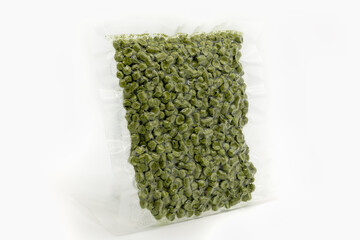 Green hop granules packed in transparent packaging