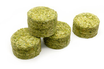 Dried hops - pressed hop pucks photographed on white background - Czech hops from the Žatec region - Czech Republic, Europe