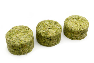 Dried hops - pressed hop pucks photographed on white background - Czech hops from the Žatec region - Czech Republic, Europe